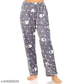 Assorted print women's woolen soft fleece pajamas for winter. Cozy, semi-warm fleece lounge pants with functional drawstring. Hand wash only, machine washable in India